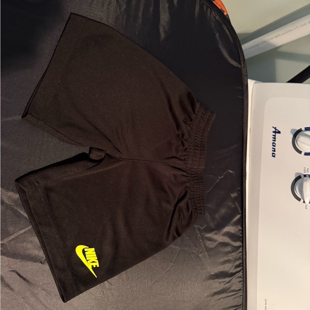 Nike Black Athletic Shorts with White Logo Tag